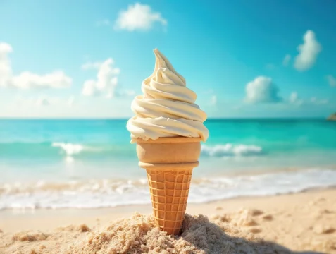 Ice Cream Cone in Sand by the Ocean