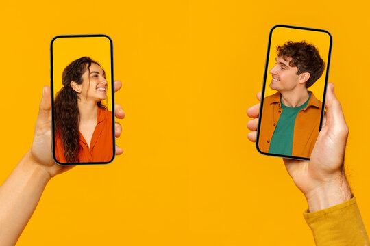 Modern virtual communication. Creative collage of male and female portraits on screens of two smartphones, boyfriend and girlfriend holding gadgets