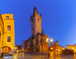 Old Town Hall in Prague Czech Republic seen at dawn from the Old Town Square with streetlights