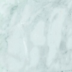 A light blue and white marble surface with subtle veining and soft texture