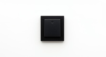 Black square electrical wall switch on white background