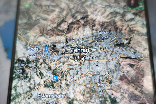 Satellite google map view of Tehran city in Iran on smartphone screen. June 13, 2025