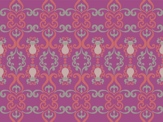 A seamless purple floral pattern with symmetrical shapes and decorative swirls, creating an elegant and vintage textile design.