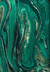 Abstract green and gold fluid art background with swirling marble texture effect