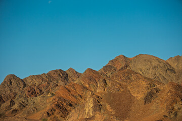 View of rocky landscape in the desert of Israel, sandstone cliffs and desert. Israel. Eilat.