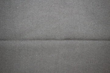 Fototapeta premium 柔らかな手触り、灰色の布の素材感
