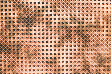 Rattan texture pattern with sunlight shadow from above. Summer beach aesthetic background. Natural minimal outdoor fashion design.