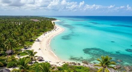 Pristine beach with turquoise water, palm trees, and white sand; people relaxing