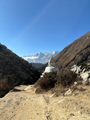 Trail with view on White Chorten and Himalayas