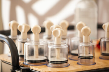  Vacuum massage cans standing on a shelf