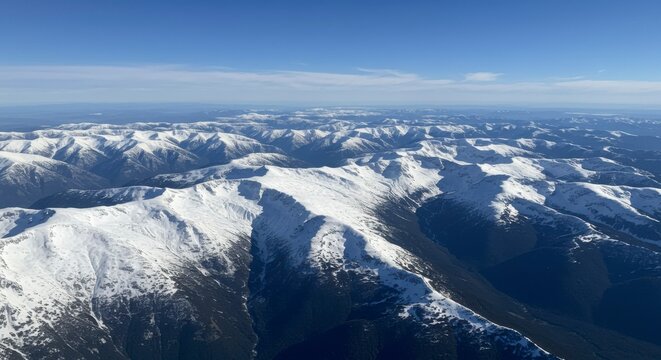 Snowy mountain range, aerial view