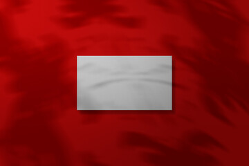 Business Card Mockup with red background. Shadow overlay effect