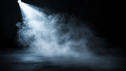 Fototapeta premium Dramatic White Spotlight Beam Cutting Through Smoke in Black and White