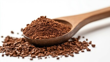 Spoon with ground coffee beans on white for food photography caffeine roasted aroma detail fresh energy drink