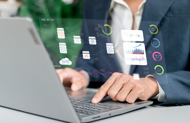 Analyst Works on Personal Computer Showing business analytics dashboard with charts, metrics and KPI to analyze performance and create insight reports for operations management.Data analysis concept