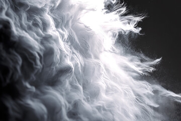 White powder swirls against a dark backdrop, creating a mesmerizing effect of movement and texture