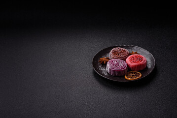 Chinese mooncake is an Asian sweet dessert. Asian mooncake as a background for your design