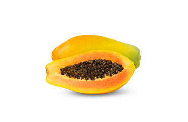 One whole papaya fruit and one half with seeds isolated.
