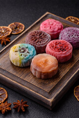 Chinese mooncake is an Asian sweet dessert. Asian mooncake as a background for your design