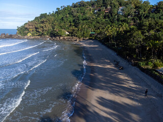 Beautiful Barra do Sahy beach at dawn on the north coast of S&atilde;o Paulo amidst the Atlantic forest