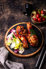 Roasted chicken drumstickswith vegetables