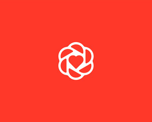 A heart logo in negative space. Cardiology health love minimalist symbol. Creative flower shutter vector icon.