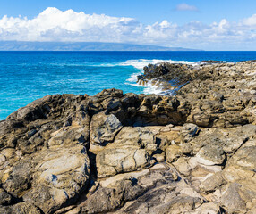 Volcanic Shoreline of Makaluapuna Point With Molokai Across Pailolo Channel, Kapalua, Maui, Hawaii, USA
