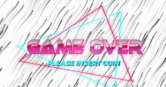 Displaying arcade screen showing pink GAME OVER and cyan PLEASE INSERT COIN with neon triangles - Powered by Adobe