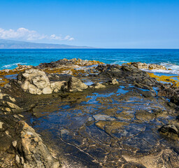 Tide Pools on The Volcanic Shoreline Below The Ironwood Cliffs, Kapalua Coastal trail, Kapalua, Maui, Hawaii, USA