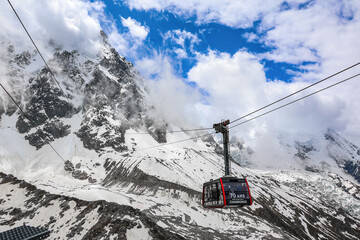 Cable car of Aiguille du Midi against the stormy clouds, Chamonix, Mont Blanc, France, Europe