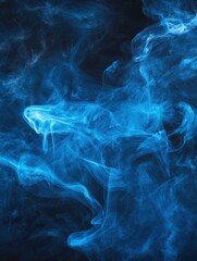 Obraz premium Graceful swirls of blue abstract smoke on a dark and atmospheric background