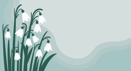 Snowdrop flowers growing on a soft background in pastel colors  