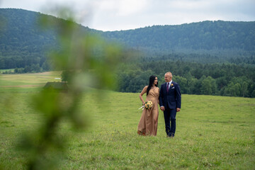 young couple walking in the park