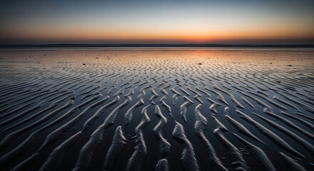 Calm Rippling Sand Patterns on Beach at Soft Colorful Sunset Horizon