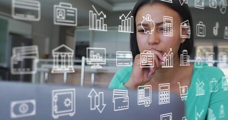 Studying laptop, woman in green sweater at office lounge with floating finance icons, copy space