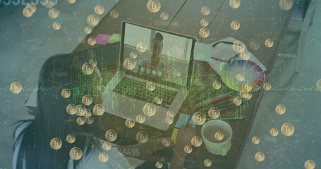 Collaborating woman using laptop at home desk, with color wheel and smartphone, bitcoin overlay