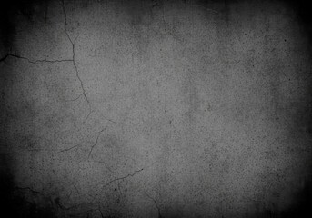 Fototapeta premium Cracked Concrete Texture - Dark gray concrete wall texture with cracks, great for backgrounds or overlays