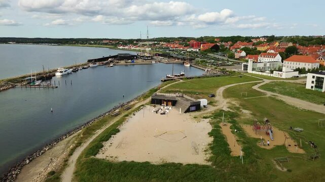 Ebeltoft Beach Bar with fregatten Jylland in background, drone view