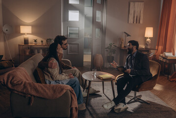 Satisfied couple express positive emotions during therapy session