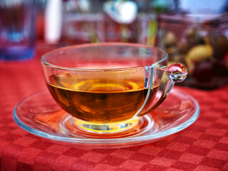 Selective focus shot of tea in a transparent glass