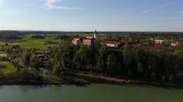 Aerial view Luftaufnahme of Attel Monastery and St. Michael Church on Attel Hill by Inn River, near Wasserburg am Inn, Bavaria. Historic Benedictine site, scenic spring landscape, rural Germany charm