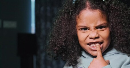 Portrait of young girl making funny face. High quality 4k footage