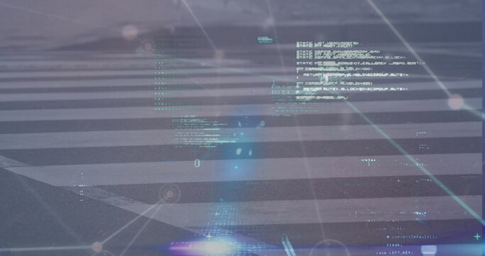 Displaying zebra-striped crosswalk projecting glowing code overlay on asphalt road, grid lines