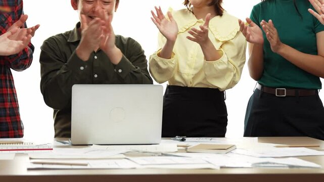 Architect and safety engineer celebrate success design building blueprint project on laptop with architectural document and measurement tool scatter around at modern office. Closeup. Delineation.