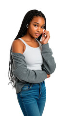 A stylish young black woman in a tank top and jeans with braids poses confidently.