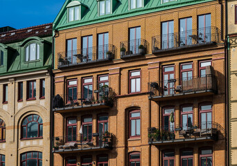 Obraz premium Historic colorful brick buildings with balconies.