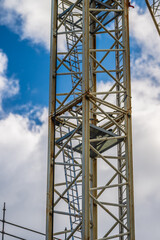 Closeup of tall construction crane structure frame.