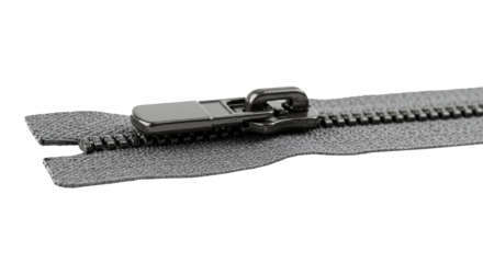 Close up of a Black fabric zipper with metal slider and teeth isolated on a transparent background