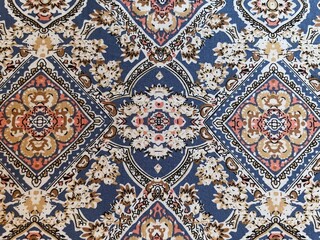 Fabric with scattered patterns, close-up as a texture. Cotton or linen fabric. Bright background with small elements.