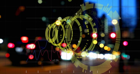 Displaying yellow circular HUD overlaying taillights on urban street at night, with +2